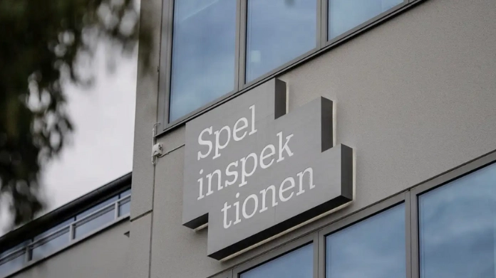 Skylt med texten "Spelinspektionen" på en byggnad.