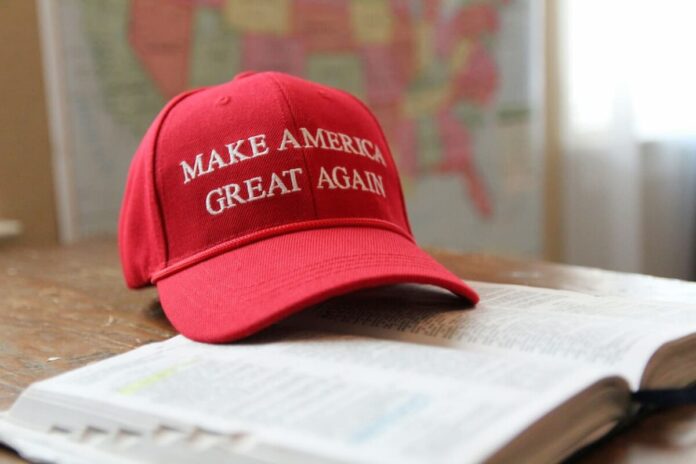 donald-trump-casino-maga A red make america great again cap