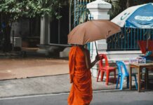 Leading Thai Abbot Disrobed in $9M Temple Funds Embezzlement, Gambling Probe