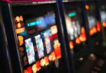 a row of slot machines inside a casino