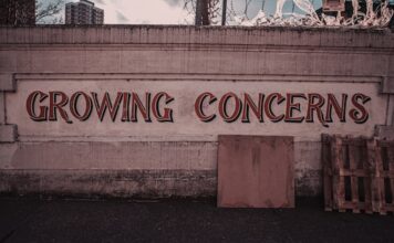 Growing Concerns wall sign