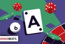 An Ace of Spades card, dice, and chips scattered on a gaming table