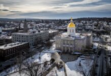 Aerial view of the New Hampshire State House in winter
