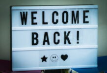 Lightbox sign with the words "Welcome Back"